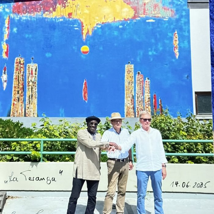 In 2025, Kalidou Kassé collaborated with artist Werner Zeh in Buchen, Germany, to create a mural celebrating friendship and cultural solidarity among people.